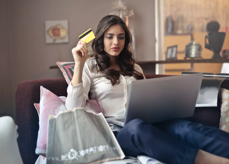 Woman Purchasing Something Online Whilst Using a Loyalty Program
